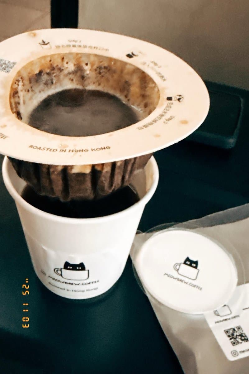 MeowBrew customer enjoying premium Hong Kong roasted coffee